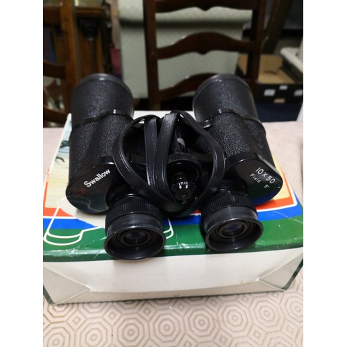 756 - 2 pairs of binoculars, a Swallow 10 x 50 and a Tronic 10 x 25 and a Brownie starlex camera