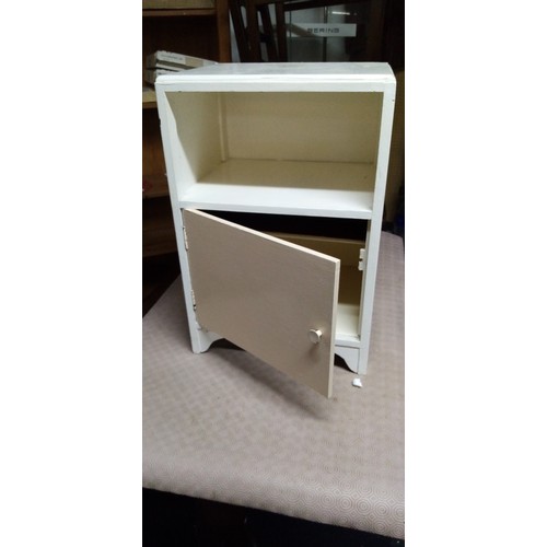 794 - White wooden bedside cabinet with cupboard to base and shelf above.