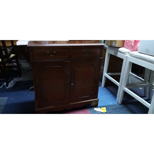 797 - Lockable wooden cupboard with 2 drawers above. Comes with key