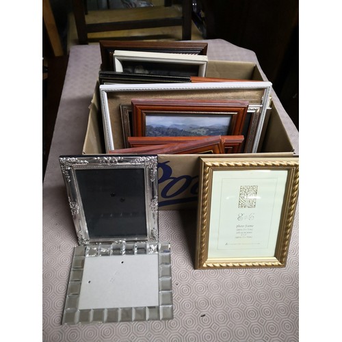 818 - Box of pictures complete with frames