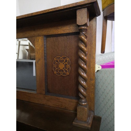 824 - Oak over-mantle mirror with barley twist supports and Art deco  design