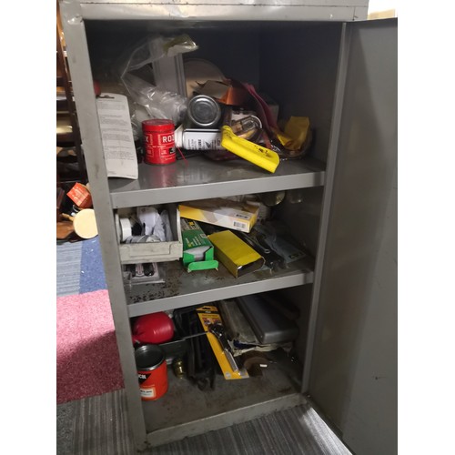 827 - Metal cabinet with 2 shelves complete with assorted tools including socket sets, hammers, wire cutte... 