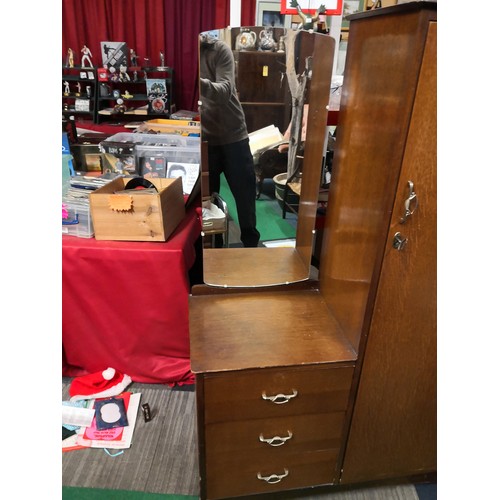 830 - Gentlemans wardrobe with hanging space to one side and 3 drawers to other side and a mirror above dr... 