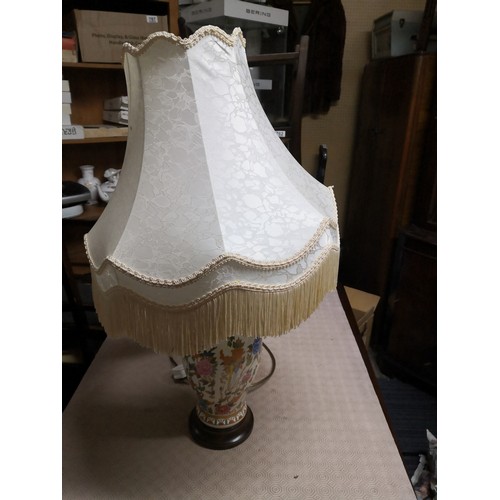 857 - Oriental style table lamp measuring 75 cms tall