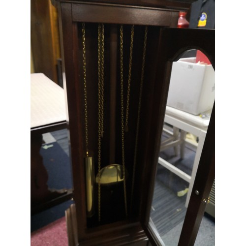 869 - Tempus Fugit oak granddaughter clock - with Westminster chimes standing 160 cms tall