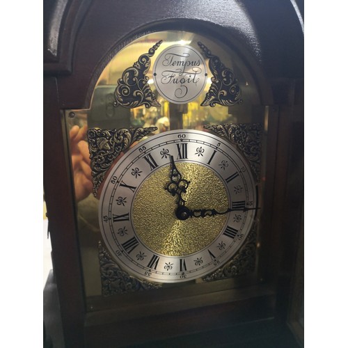 869 - Tempus Fugit oak granddaughter clock - with Westminster chimes standing 160 cms tall