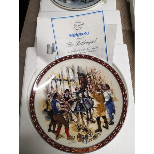 880 - 4 x 1980's Wedgewood collectable plates, The Caroler's, Decorating the Christmas tree, The Bell Ring... 