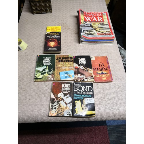 894 - 6 x james bond paperbacks and 2 x close encounters of the third kind paperbacks