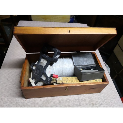 900 - Vintage wooden tool box including twine, tape measures and some tools