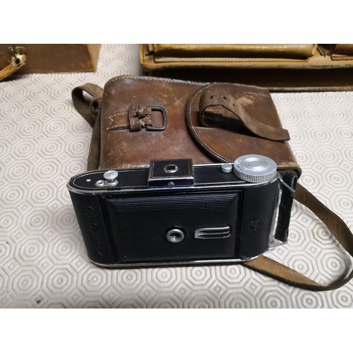 914 - A leather satchel, a leather case and a Agfa Billy record camera in original case