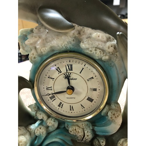 132 - Retro Dolphin clock by Windsor with quartz movement
