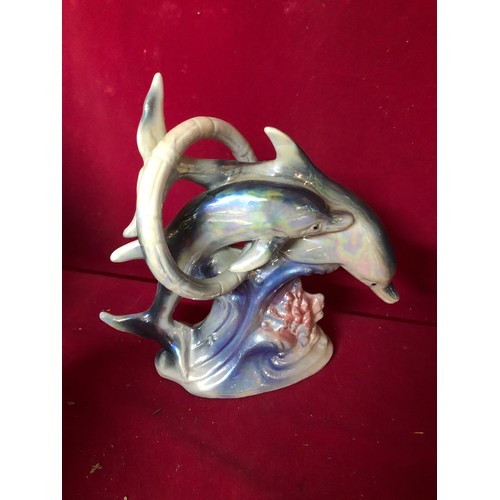 734 - Selection of blue lustre Dolphins of various designs.