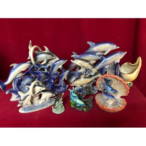 734 - Selection of blue lustre Dolphins of various designs.