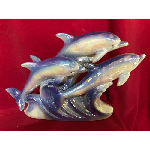734 - Selection of blue lustre Dolphins of various designs.