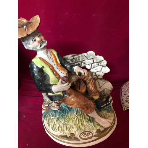 736 - Selection of capodimonte figures. Two of the man eating a watermelon and one of man drinking.