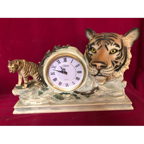 737 - Decorative clock depicting a small tiger and a larger tigers head from the Juliana collection.