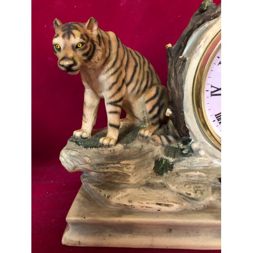 737 - Decorative clock depicting a small tiger and a larger tigers head from the Juliana collection.