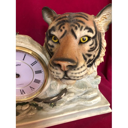 737 - Decorative clock depicting a small tiger and a larger tigers head from the Juliana collection.