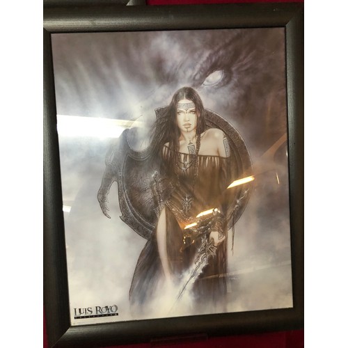 741 - Four pictures in black frames from the Luis Royo Collection depicting semi nude women. They all meas... 