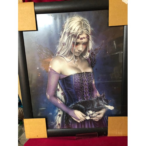 741 - Four pictures in black frames from the Luis Royo Collection depicting semi nude women. They all meas... 