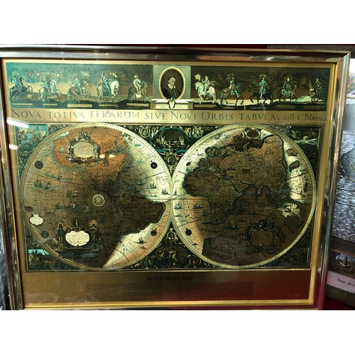 742 - Three etched world map pictures each measuring  56cms x46cms, 2 are predominantly gold in colour wit... 