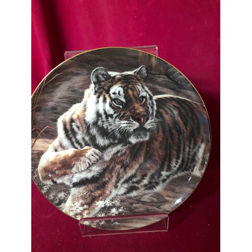747 - Set of 4 decorative plates by Royal Doulton depicting Tigers