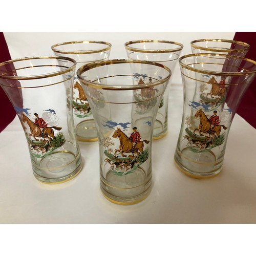 755 - Set of 12 vintage glasses with gold trim and fox hunting motif.