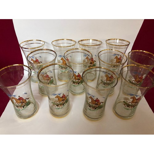 755 - Set of 12 vintage glasses with gold trim and fox hunting motif.