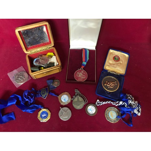 770 - Box of medals and pin badges.