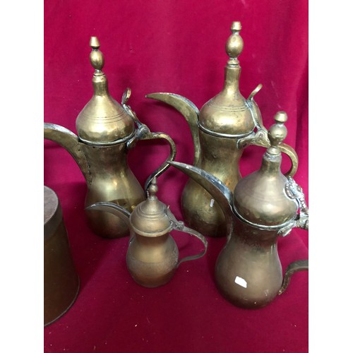 780 - Large box of Brassware including jugs, fireside set and candlesticks