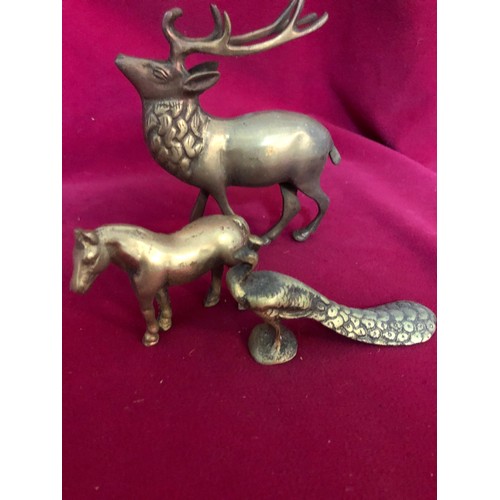 36 - Selection of brass animals including stag, horse, heron, peacock, pelican and bull