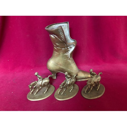 60 - A brass boot measuring 22 cms tall and 3 brass figures on horseback made in Italy measuring 10cms ta... 