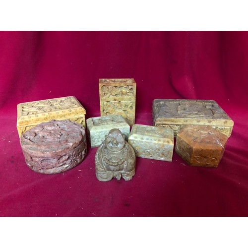 44 - Selection of 7 carved soapstone trinket boxes and a Buddha