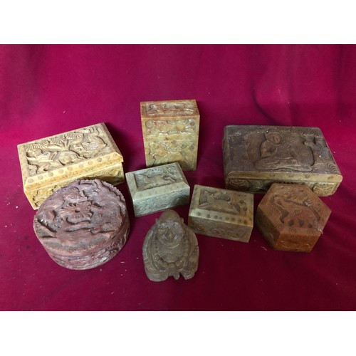 44 - Selection of 7 carved soapstone trinket boxes and a Buddha