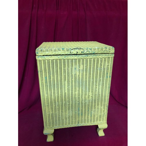 21 - A Lloyd loom linen box measuring 31x39x55cms tall
