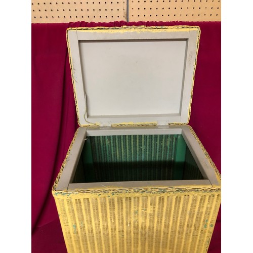 21 - A Lloyd loom linen box measuring 31x39x55cms tall