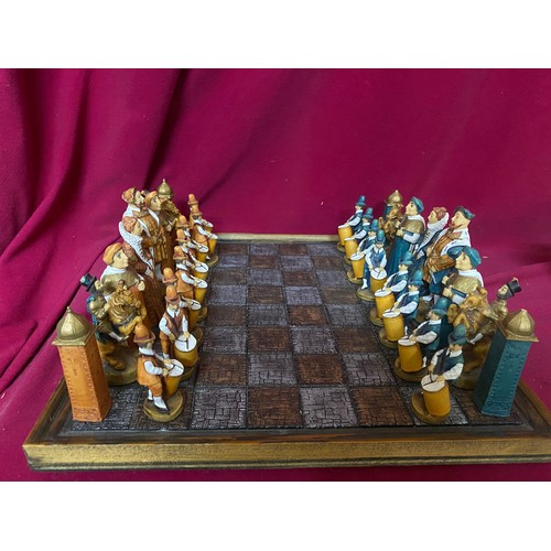 53 - Resin Chess set complete with board