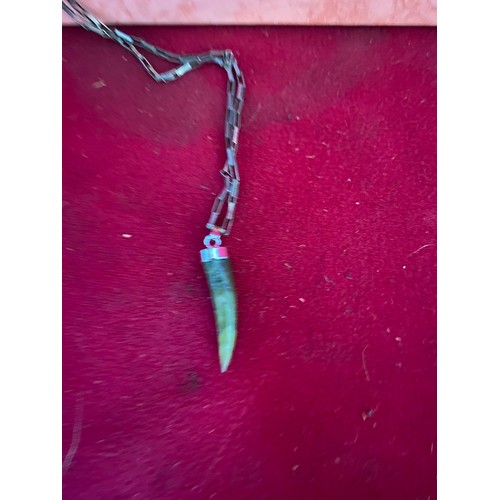 28 - Silver necklace with Jade tooth pendant