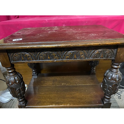 79 - Edwardian oak 2 tier coffee table with carved decoration