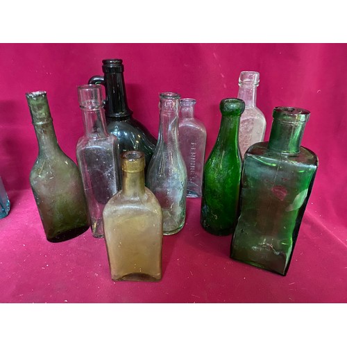 748 - Assorted antique and vintage apothecary blue bottles, green water and beer bottles, Beano and H.P. S... 