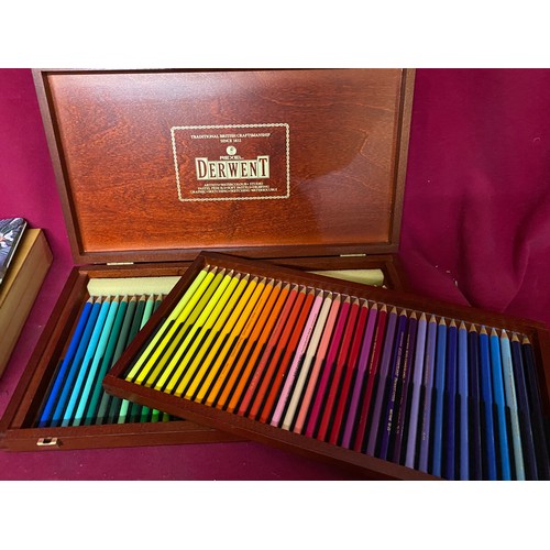 682 - Assortment of art including a Reeves paintbox, a Derwent coloured pencil box and a WHSmith coloured ... 