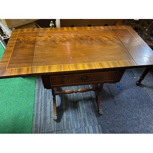 998 - Drop end occasional table in oak with claw feet on castors with drawer to underneath