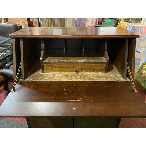 639 - Oak writing Bureau with drop down front and letter compartments to inside.  2 Door cupboards to base... 