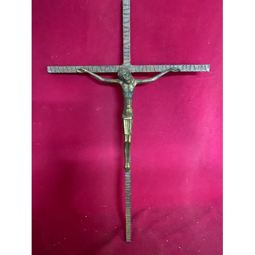 642 - Crucifix on wood 63cms and another on metal 45cms. Continental in design.