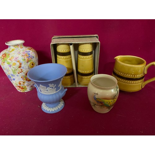 648 - Selection of pottery including wall flower sleeves, salt and pepper pots with matching cream jug