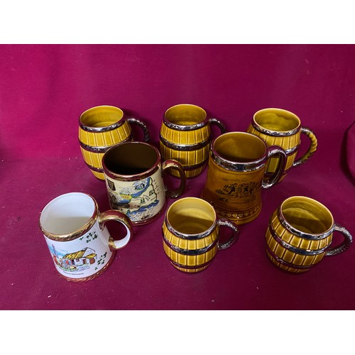 654 - Selection of pottery tankards from Wade, Gibsons and Carrigaline Potteries.