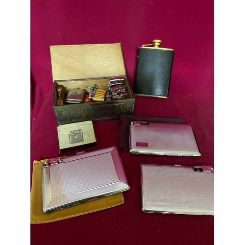 662 - Selection of vintage cigarette cases/lighters, hip flask and lighters.