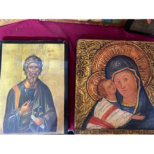 637 - Selection of religious paintings on wood.