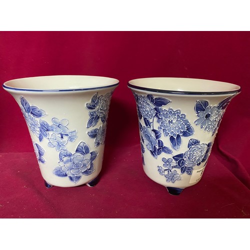 9 - Pair of blue and white plant pots measuring 17 cms tall