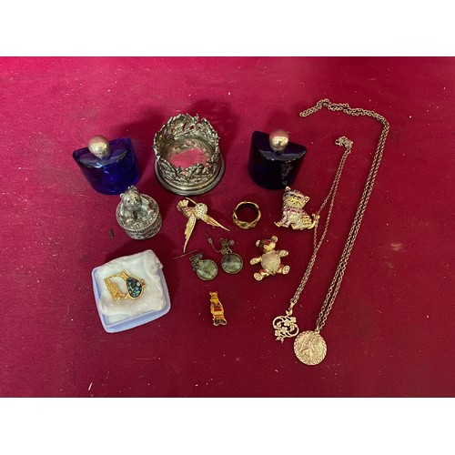 44 - Selection of necklaces, earrings, brooches and perfume bottles